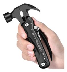 a hand holding a black pliers in it's right hand and the tool is open