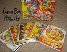 cereal box notebooks are sitting on the floor