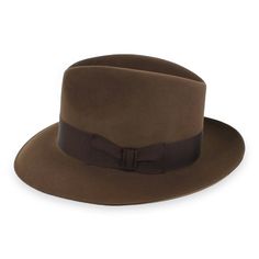 A true classic, the Woodbury is a traditional fedora made of 100% fur felt, a durable material that naturally repels water. The grosgrain ribbon hat band has been carefully dyed a deep brown to complement the Woodbury's tone-on-tone look. For two different styling options, the brim can be snapped up or down. The interior features a full satin lining and a genuine cowhide leather inner band. Made in the USA by Stetson, the Belfry Woodbury features extraordinary American craftsmanship! FEATURESSty Pork Pie Hat, Hat Size Chart, Pork Pie, Felt Fedora, Cloche Hat, Measurement Tools, Deep Brown, Felt Hat, Hat Band