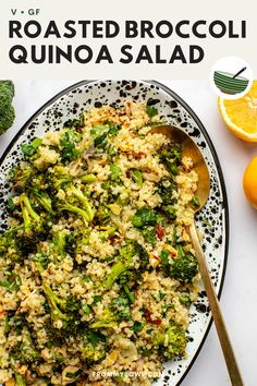 broccoli and quinoa salad on a plate with oranges in the background