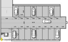 an overhead view of a parking garage with several cars parked in the space between them