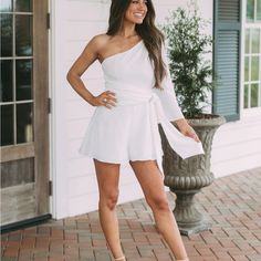 White One Shoulder Romper Size Large. Do+Be Brand From These Three Boutique. New With Tags. White Chic Jumpsuits And Rompers For Brunch, Chic White Jumpsuits And Rompers For Brunch, White Summer Jumpsuit For Brunch, Lavender Cocktail Dress, One Shoulder White Dress, One Shoulder Romper, Teal Party, Magenta Dress, Shoulder Ruffle Dress