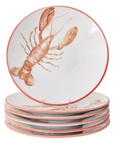 four plates with lobsters painted on them stacked up in front of each other against a white background