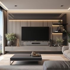 a living room with a large flat screen tv mounted on the wall above it's entertainment center