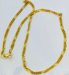 Figaro chain necklace, 916 Yellow Gold GOLD PURITY : 916 gold purity Weight: 18-18.50 grams  Size   :  19 inches Length  Colour : YELLOW GOLD Width : Appx 4mm  Hallmark: Hallmarked 916 stamp Hook: '' S hook Design  : solid famous figaro chain Authentic 916 Gold FAQs Q: Is it real gold? A: yes it's real authentic genuine 916 gold  Q: can pawn? A: yes it's pawnable ⭐️GoForRealGold⭐️ 22k Gold Figaro Chain Necklace As Gift, 22k Gold Figaro Chain Necklace, Gold Figaro Chain, Figaro Chain Necklace, Hook Design, S Hook, Figaro Chain, Figaro Chains, Colour Yellow