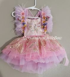 Sparkly Butterfly Deluxe romper is just perfect. A fully beaded butterfly mesh fabric, in Nudes, ivory and champagne colors with light pink tulle. Handmade to order in the USA Customs welcomed, dress available upon request. Pink Fairy Style Tutu Dress For Summer, Fitted Glitter Tulle Tutu Dress For Summer, Pink Glitter Tulle Dress For Spring, Whimsical Lavender Dress For Party, Pink Glitter Tulle Tutu Dress For Summer, Pink Glitter Tulle Tutu Dress For Wedding, Pink Glitter Tulle Tutu Dress For Spring, Lavender Tutu Dress For Summer Party, Pink Fairy Dress For Pageant