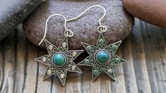 -- Listing is for ONE (1) pair of earrings -- Turquoise and Bali sterling silver -- Charm measures 24mm -- Total length 36mm (just over 1-1/4") See more STAR EARRINGS here -https://www.etsy.com/shop/StaggsLaneSupplies?ref=seller-platform-mcnav&search_query=star+earrings See more CELESTIAL charms here - https://www.etsy.com/shop/StaggsLaneSupplies?ref=seller-platform-mcnav&search_query=celestial+charms See more charms and pendants in my shop - https://www.etsy.com/shop/StaggsLaneSupplies?ref=sell Sterling Silver Star Earrings, Silver Star Earrings, December Birthstone, Moon Earrings, Silver Stars, Star Earrings, Sterling Silver Charm, Artisan Jewelry, Favorite Jewelry