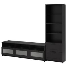 a black entertainment center with drawers and shelves