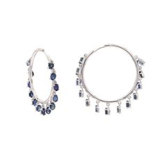 This is part of Chairish’s Fine Jewelry assortment.  You shall need blue sapphire hoop earrings in 14K Gold to make a statement with your look. These earrings create a sparkling, luxurious look featuring oval cut gemstone. If you love to gravitate towards unique styles, this piece of jewelry is perfect for you.   PRODUCT DETAILS :-  > Material - 14K solid White gold > Gemstone - Blue Sapphire  > Gemstone Weight - 5.9 ct > Gemstone pieces - 26 pcs > Gemstone size - 4 x 3 mm > Gemstone shape - Ova Sapphire Round Hoop Earrings Fine Jewelry, Sapphire Hoop Earrings Fine Jewelry, Luxury Blue Hoop Jewelry, Elegant Sapphire Hoop Earrings, Luxury Blue Hoop Earrings, Blue Sterling Silver Hoop Earrings Fine Jewelry, Elegant Sapphire Hoop Jewelry, White Gold Hoop Earrings With Gemstones, Sapphire Hoop Earrings