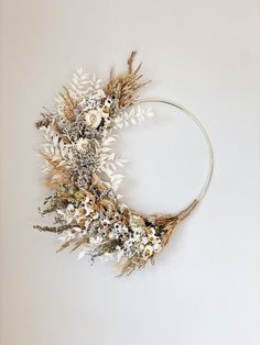 a dried wreath hanging on the wall