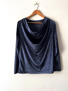 "Vintage Comfortable Velvet Blouse Long Sleeve Velvet Top Women's Navy blue velvet blouse Velour Shirt Medium size women's everyday jumper N.B. Real color might slightly differ from picture. Estimated size: M Measurements (lying flat): Shoulders: 15\"/ 38 cm Pit to pit: 20\"/ 50.7 cm Waist: 19\"/ 48 cm Sleeve: 24.5\"/ 62 cm Length: 27.5\"/ 70 cm Please check measurements to insure a proper fit. Remember to allow yourself some extra room for movement. You can compare these with something from your closet that fits you well. This blouse will come to you freshly laundered and ready to wear. Please feel free contact me if you need additional measurements or have any questions Condition: Great Vintage Condition SHIPPING * I ship worldwide via Priority mail (Latvijas Pasts) from Latvia (EU). * I Winter Velvet Long Sleeve Tops, Velvet Long Sleeve Tops For Fall, Fall Velvet Long Sleeve Tops, Navy Blue Velvet Blouse, Blue Velvet Blouse, Velvet Blouses, Velvet Tops, Navy Women, Long Blouse