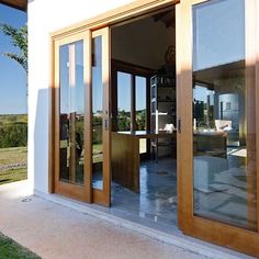 an open patio with sliding glass doors leading outside