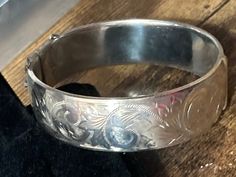 Wide sterling silver engraved floral 925 ornate bangle full hallmarks heavy 44.6 gms bracelet    Has links for safety chain  full set hallmarks Large Bracelet, Safety Chain, Vintage Belts, Everyday Jewelry, Sterling Silber, Full Set, Chain Link, Bangle Bracelets, Really Cool Stuff