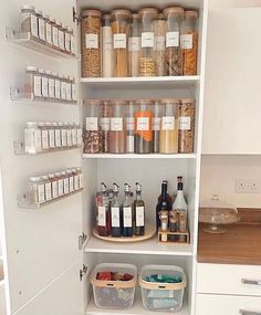 an open pantry with lots of spices and condiments