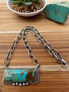 Sterling Silver Stamped and Hallmarked By: Augustine Largo Kingman Turquoise Measures 19" End to End Pendant 1" x 2" Secure Clasp Adjustable chain End To End, Necklace Turquoise, Kingman Turquoise, Bar Necklace, Pendant Earrings, Turquoise Jewelry, Belt Buckles, Ring Earrings, Cuff Bracelets