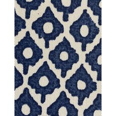 a blue and white rug with an intricate design