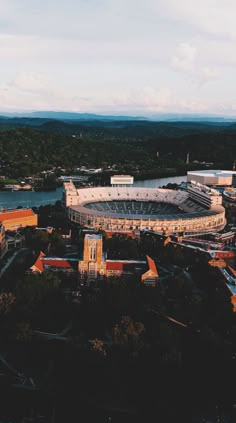 an aerial view of a stadium and surrounding buildings