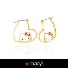 the hello kitty earrings are in yellow gold