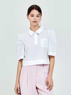 Composition : COTTON 100%Country of Origin : Republic of Korea Modern Half Sleeve Tops For Workwear, Short Sleeve Puff Top With Blouson Sleeves For Work, Modern White Blouse With Cuffed Sleeves, Modern Blouse With Collar, Modern White Tops With Collared Neckline, Modern Collared Office Tops, Chic Half Sleeve Office Tops, White Half Sleeve Office Blouse, Chic Half Sleeve Tops For Office