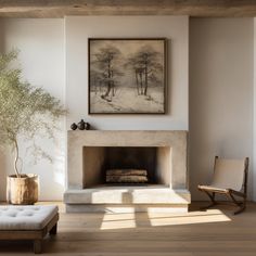 a living room filled with furniture and a painting on the wall above a fire place