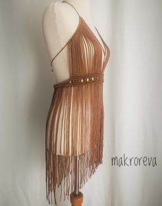 Fitted Bohemian Mini Dress With Fringe, Sleeveless Fringe Mini Dress For Festivals, Brown Sleeveless Fringe Dress, Sleeveless Brown Fringe Dress, Sleeveless Brown Dress With Fringe, Fitted Fringe Mini Dress For Festival, Brown Bohemian Mini Dress, Fitted Brown Dress For Festival, Bohemian Brown Mini Dress