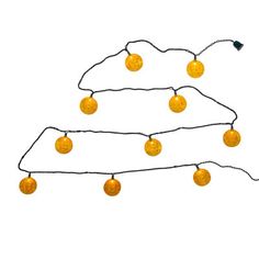 three string lights with orange balls hanging from the top and bottom of each light, on a white background