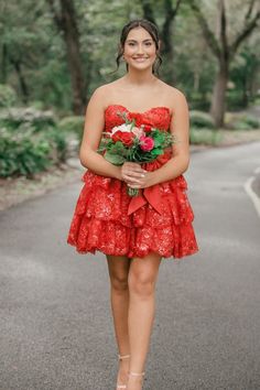 Red Appliques Tiered Short Dress with Bow Red Ruffled Dress For Homecoming, Red Wedding Dress With Attached Cancan, Red Lace Corset Back Dress, Red Sleeveless Lace Corset Dress, Red Lace Corset Dress With Corset Back, Red Lace Corset Dress For Party, Lace Tulle Tiered Dress, Sleeveless Red Corset Dress With Ruffles, Red Ruffled Dress For Debutante Ball