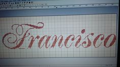 a computer screen with the word san francisco written in red and white cross - stitch