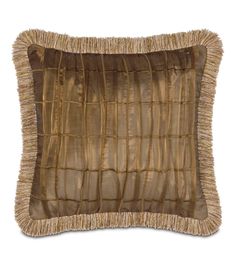 a brown pillow with fringe trim on the front and back of it's sides