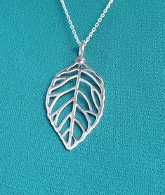 "All pieces are sent in a giftbox and placed in a netted, organza bag, ready for gift giving! Sweet sterling silver leaf pendant with 16\"-18\" - depending on availability and styles of chain may differ. Chain included. Chain styles may vary." Silver Leaf-shaped Necklaces For Gift, Silver Leaf-shaped Necklace Gift, Silver Leaf-shaped Necklace For Gift, Handmade Silver Leaf-shaped Necklace, Hypoallergenic Leaf-shaped Jewelry Gift, Sterling Silver Leaf Necklace, Sand Dollar Necklace, Pendant With Chain, Leaf Necklace