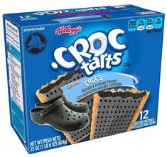 a box of croc - tars shoes sitting on top of a white table