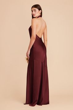 the back of a woman in a burgundy gown