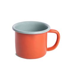 an orange and grey coffee cup on a white background