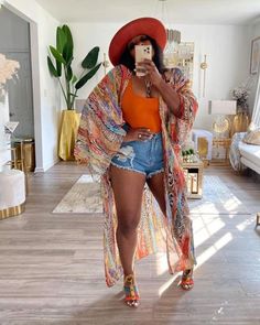 Size (in) Bust Length S 57.9 56.3 M 59.4 56.7 L 61.0 57.1 XL 62.6 57.5 2XL 64.2 57.9 Multi Color Kimono for everyday casual use, beachwear or pair it up with a cute pair of jeans or shorts and add the finishing touches of a high heel or sandal. All eyes on you as you float across the room or resort on this beauty. Multi color printed duster with oversized sleeves Wear as a swimsuit cover up or over jeans and a tank. Mixed print, open front long kimono Loose fit Animal Print Kimono, Looks Jeans, Fest Outfits, Sunset Boulevard, Vacay Outfits, Looks Street Style, Trendy Fashion Outfits, Print Kimonos, 1st Anniversary