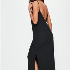 Brand New With Tag Look Sleek And On Fleek Wearing This Versatile Black Dress - Featuring A Maxi Length, Low Back And Cami Style. Regular / Stretch Fit Black Slip Dress With Side Slits, Chic Black Slip Dress With Side Slits, Chic Longline Maxi Dress For Party, Black Longline Midi Dress For Party, Black Longline Dress For Date Night, Black Maxi Dress With Side Slits And Spaghetti Straps, Black Maxi Dress With Side Slits For Vacation, Sleek V-neck Maxi Dress For Summer, Black Midi Slip Dress For Beach