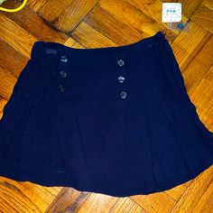 Nwt Free People Navy Mini Skirt Size: 2 Good Condition Never Worn Tags Attached Navy Casual Pleated Skirt Bottoms, Pink Leather Skirt, Navy Mini Skirt, Camo Mini Skirt, Godet Skirt, Black Leather Mini Skirt, Velvet Mini Skirt, White Mini Skirt, Faux Leather Mini Skirt