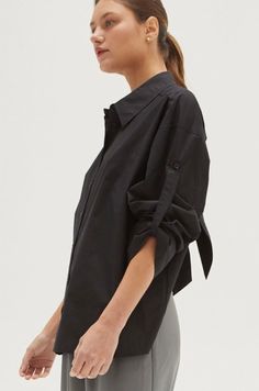 Evie Tie Back Poplin Shirt 100% COTTON -Button front placket -Poplin shirt -Tie back detail -Wide cuffed sleeve hem Model height is 5'9" wearing a small size S