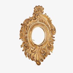 Antique Portuguese Baroque Gilded Wall Mirror Pair (1900-1920)  Exquisite pair of antique gilded Portuguese baroque wall mirrors. Crafted from solid chestnut wood and adorned with intricate vegetal detailing, these mirrors exude timeless elegance.  The hand-carved frames and vintage patina add a touch of opulence and history. Provenance: Vila Real de trás os montes, Portugal 1900-1920  Chestnut wood, gilded,Baroque style.  Excellent period condition (minor interior stains on mirrors and minimal wear). Dimensions:  Height: 37 cm / 14.56 in. Width: 25 cm / 9.84 in. Depth: 3.5 cm / 1.37 in. Ideal for: Vintage decor, Bohemian interiors, Collectibles. Baroque Mirrors, Baroque Wall, Bohemian Interiors, Baroque Mirror, Chestnut Wood, Gilded Mirror, Decor Mirror, Bohemian Interior, Baroque Style