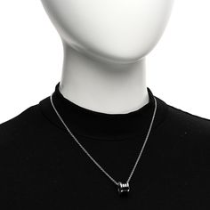 This is an authentic BULGARI Sterling Silver Ceramic Save The Children Pendant Necklace. The necklace is crafted of sterling silver and features a black ceramic B.zero1 barrel motif framed by the BVLGARI logo engraved on either side. Bvlgari Logo, Black Ceramic, The Necklace, Barrel, A Black, Pendant Necklace, Ceramics, Sterling Silver, Pendant