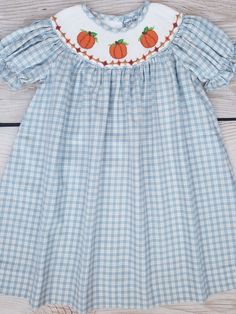 Three Sisters Pumpkin Smocked Bishop Dress Fall Smocked Dress With Short Sleeves, Fitted Smocked Dress For Fall, Short Sleeve Gingham Smock Dress, Gingham Short Sleeve Dress With Smocked Bodice, Short Sleeve Gingham Dress With Smocked Bodice, Gingham Dress With Smocked Bodice And Short Sleeves, Fall Cotton Smocked Back Dress, Fall Cotton Smocked Dress, Fall Cotton Dresses With Smocked Back