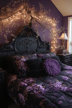 a bed with purple and black comforter in a bedroom