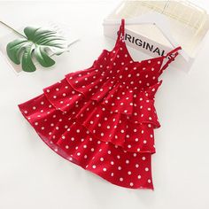 Polka Dot Dress for Toddler Girl - PrettyKid Playful Red Sundress For The Beach, Cute Red Sundress For The Beach, Cute Red Sundress For Beach, Cute Red Beach Sundress, Cute Red Sleeveless Sundress, Playful Red Sundress For Summer, Cute Red Sundress For Spring, Cute Red Sundress For Vacation, Dress For Toddler Girl