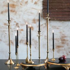 Each Antique Candlestick features a classic round foot that tapers up to a slim stem and is topped off with a perfect cup for holding a taper candle. 2.25in Dia x 10.25in H Finish: Gold or Silver Material: Metal Set of 2 Imported Shop more Hype Decor Antique Candle Sticks, Gold Candle Holders, Romantic Candles, Black Gold Jewelry, Gold Candles, Black Candles, Gold Party, Gothic Decor, Wedding Candles