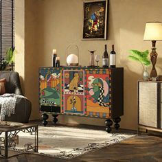 a living room filled with furniture next to a painting on the side of a wall