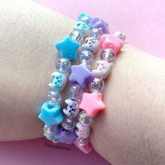 💜Kawaii starry kitty bracelets!   Choose from two sizes  💜Fits up to a 6.5 inch wrist 💜Fits up to a 7.5 inch wrist  3 Colors: Pink Purple Blue Cute Pink Star-shaped Bracelets, Cute Multicolor Star-shaped Beaded Bracelets, Cute Adjustable Star Bracelets, Cute Adjustable Star-shaped Bracelets, Bracelets Kawaii, Star Bracelets, Hobby Inspiration, Kawaii Bracelet, Bead Star