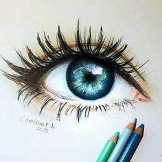 a pencil drawing of an eye with long lashes and blue eyeshade next to two colored pencils