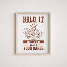 a poster hanging on the wall that says hold it, bid you wash your hands