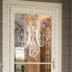 the front door is decorated with an ornamental design