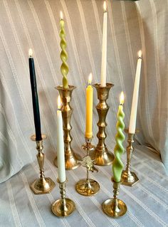 a group of candles sitting on top of a table