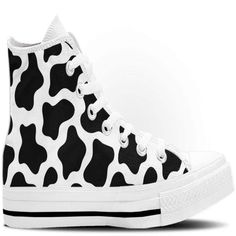 black and white cow print high top sneakers